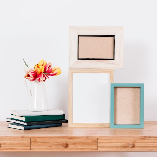 Arranged photo frames on table