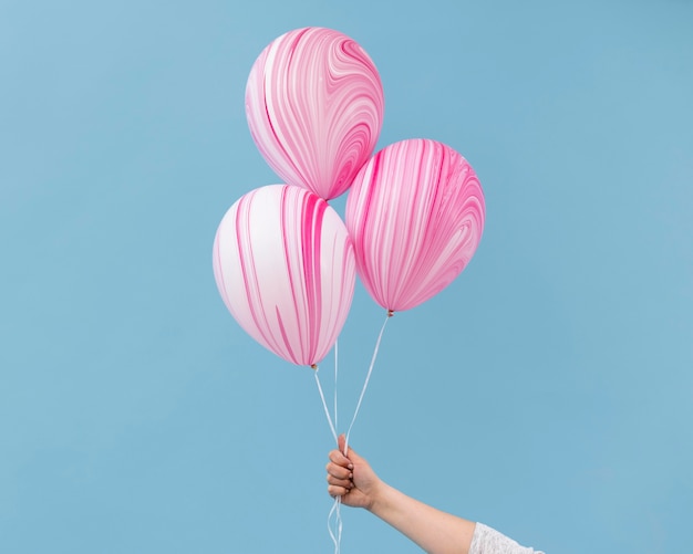 Arrangement of abstract pink balloons