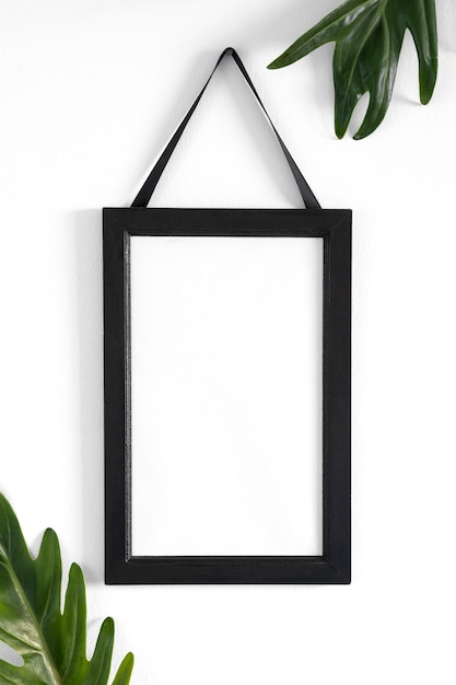 Free photo arrangement of black empty frame