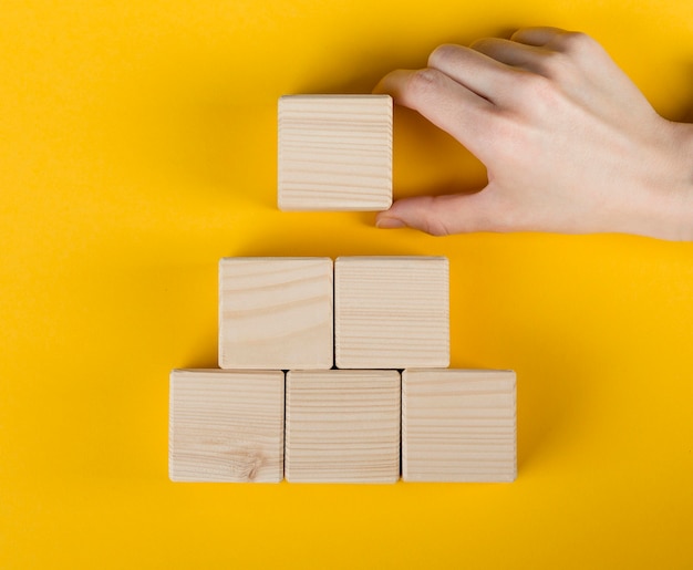 Free photo arrangement of blank wooden cubes