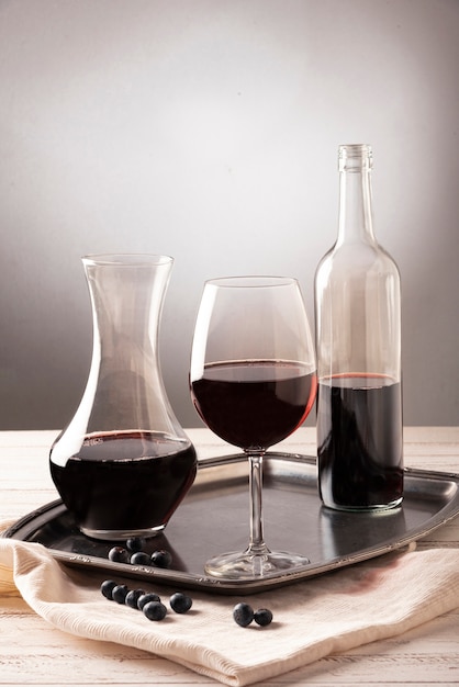 Arrangement of bottles and glass of wine