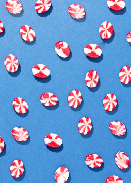 Free Photo arrangement of candies on blue background