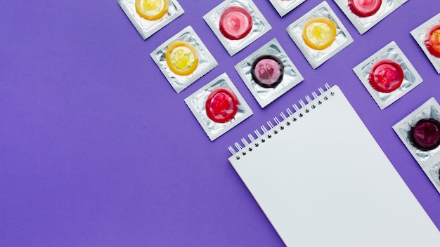 Free Photo arrangement of contraception concept on purple background with copy space