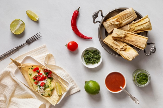 Arrangement of delicious tamales on plate