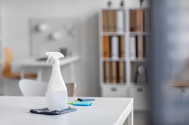 Free photo arrangement of disinfecting products on a desk