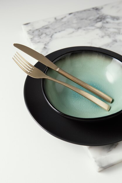 Arrangement of elegant tableware on the table