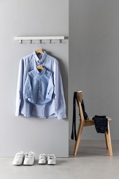 Free photo arrangement of father and son clothing