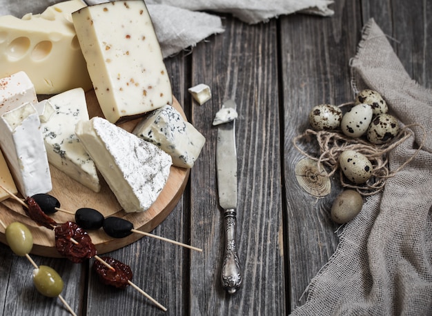 arrangement of gourmet cheeses