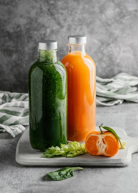 Arrangement of healthy drinks in glass bottles