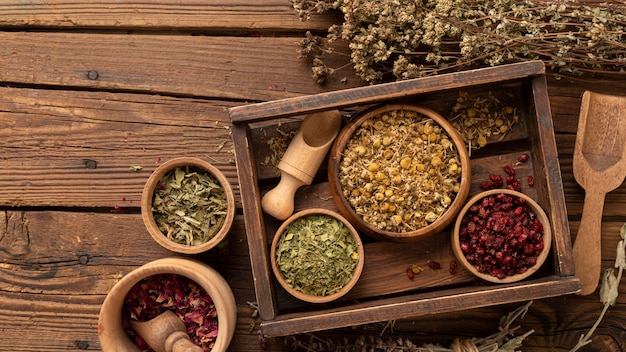 Arrangement of natural various herbs in a wooden box