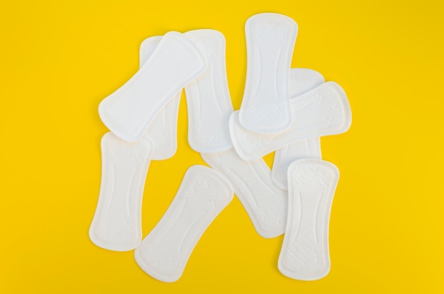 Arrangement of pads on yellow background