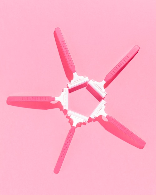 Arrangement of pink razor blades top view