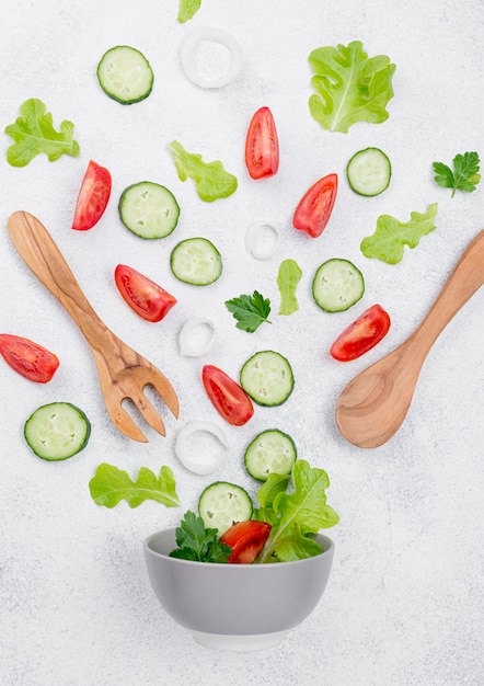 Free Photo arrangement of salad ingredients on white background