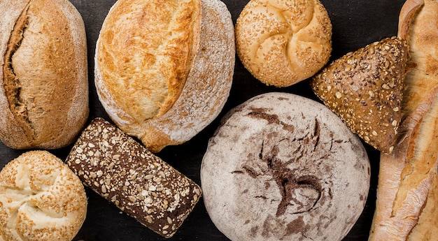 Free photo arrangement of various types of baked bread