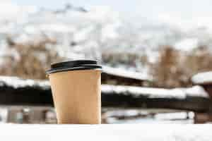 Free photo arrangement with coffee cup outdoors