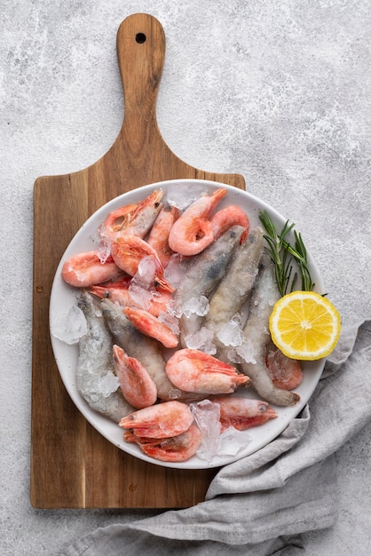 Free photo arrangement with frozen sea food on the table