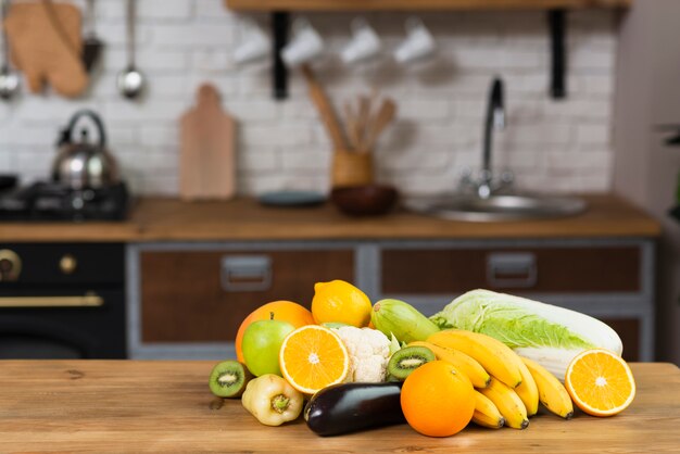 Arrangement with fruits and vegetables in the kitchen