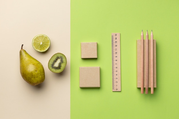 Free Photo arrangement with stationery elements and fruit