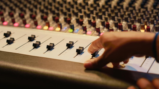 Free Photo artist composer creating a new song on his electro guitar in studio