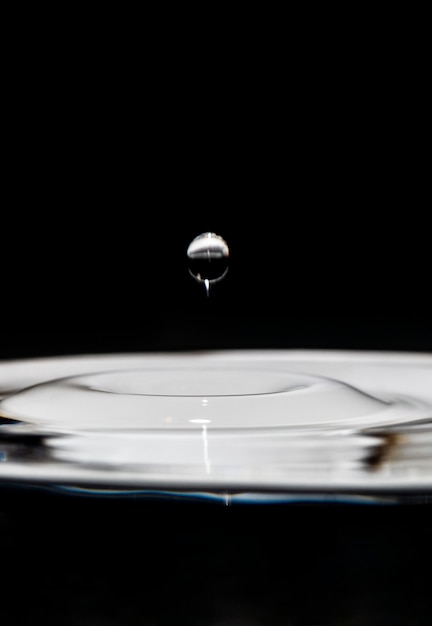 Free Photo artistic floating water drop black and white effect