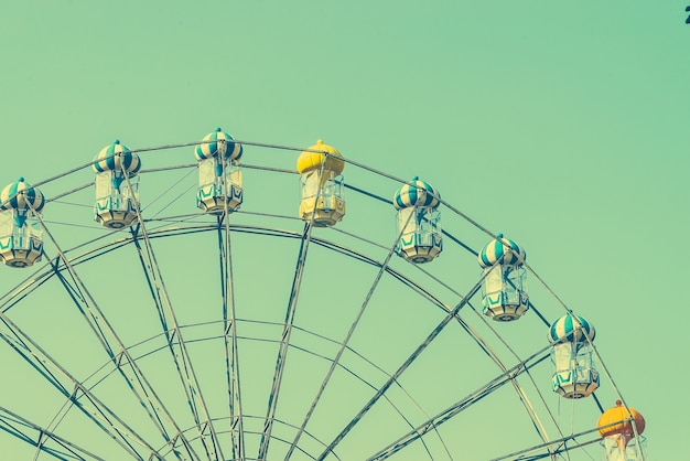 Free photo artwork turquoise fun wheel fairground