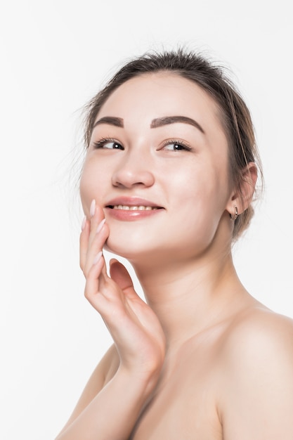 Asian beauty face closeup portrait with clean and fresh elegant lady isolated on white wall