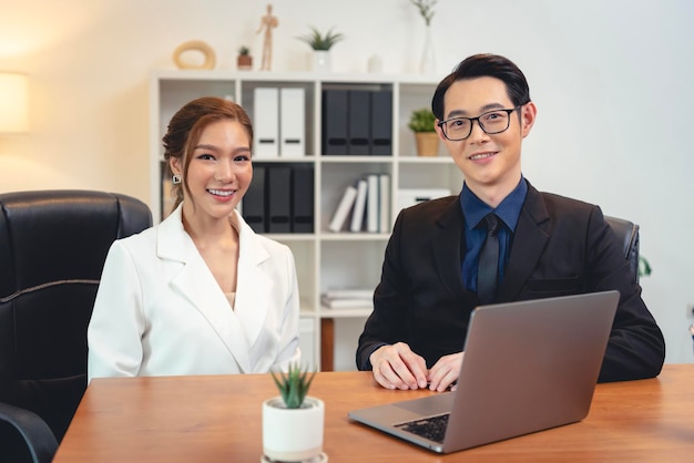 Asian businesspeople confident and relaxing at office meeting room Business team concept