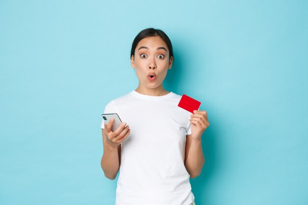 Asian female in casual T-shirt posing