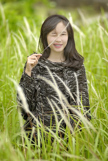 Asian girl in the meadow