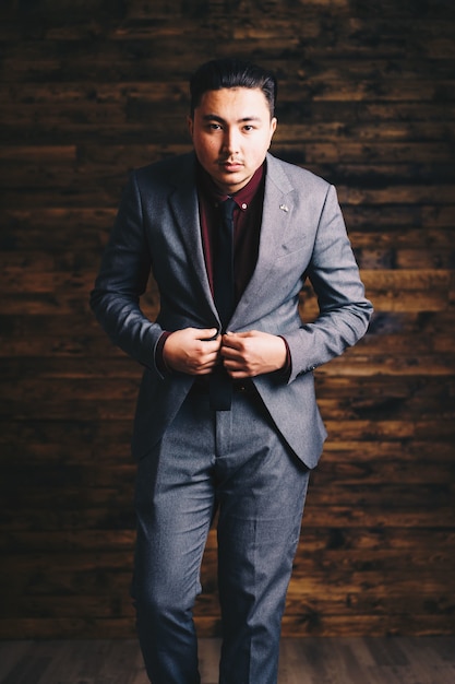 Free photo asian man wearing suit