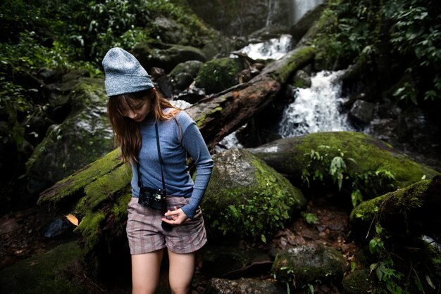 Asian woman enjoying an outdoor trip