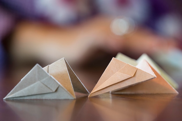 Free Photo asian woman making origami with japanese paper