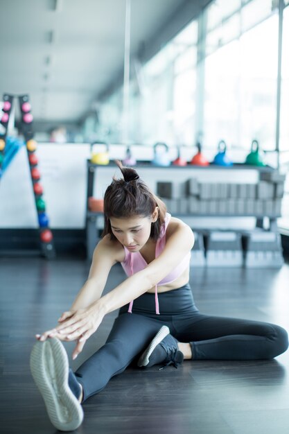 asian woman play fitness in the gym