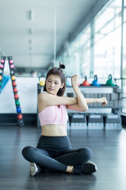 asian woman play fitness in the gym