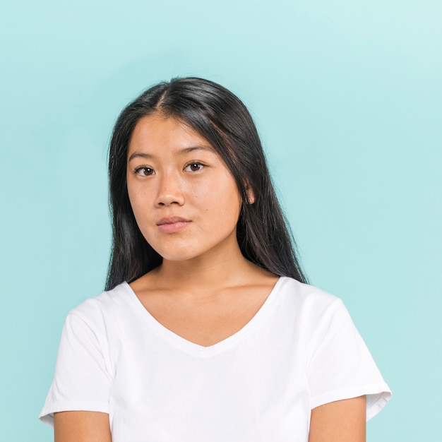 Asian woman posing and looking at camera