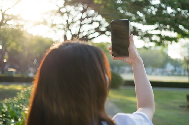 asian woman using smartphone