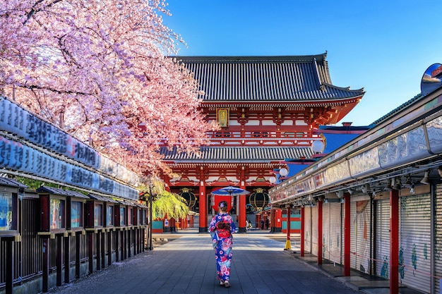 Asian woman wearing japanese traditional kimono at Temple in Tokyo, Japan.