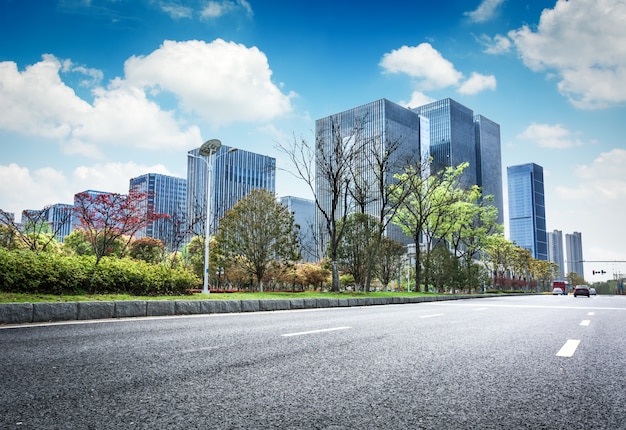 Asphalt road and modern city