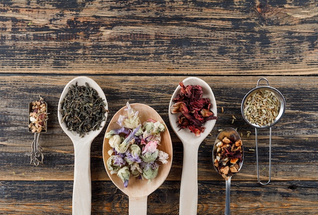 Free Photo assorted dried herbs in scoop and spoons with spices