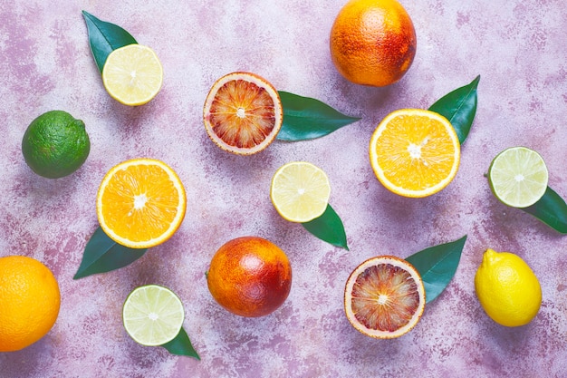 assorted fresh-citrus fruits,lemon,orange,lime,blood orange,fresh and colorful, top view