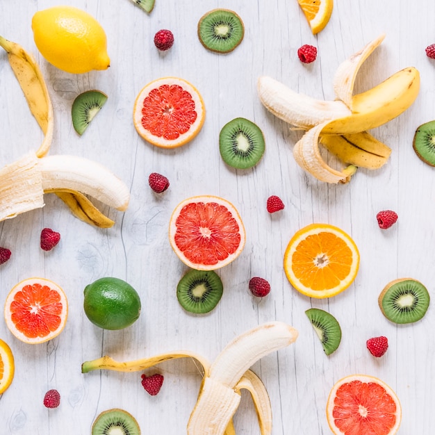 Free photo assorted fruits on wooden tabletop