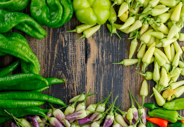 Assorted peppers on a wooden. flat lay.