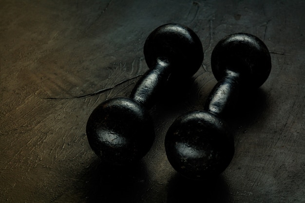 Free Photo assorted sports equipment isolated on black studio background