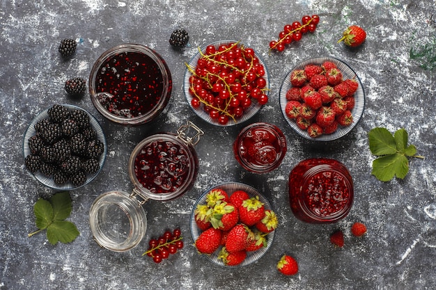 Free photo assortment of berry jams,top view