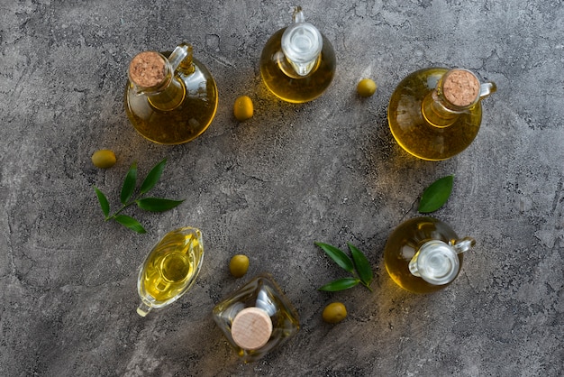 Free Photo assortment of bottles filled with olive oils