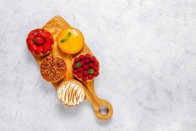 Assortment of crispy tartlet with filling.