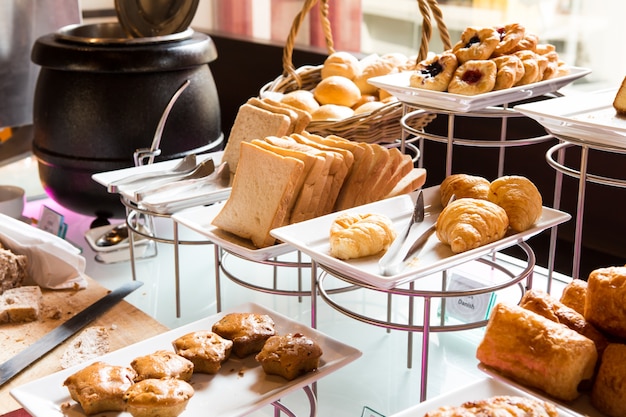 Assortment of fresh pastry on table in buffet