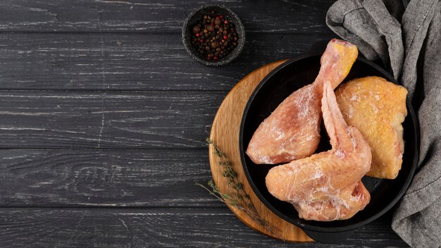 Assortment of frozen chicken on the table