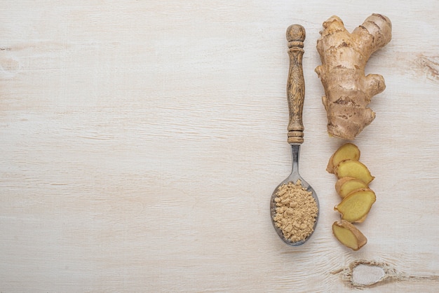 Free photo assortment of ginger on wooden table with copy space