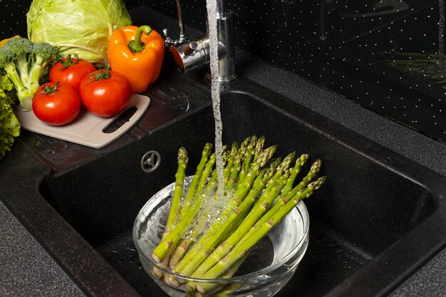 Assortment of healthy food being washed